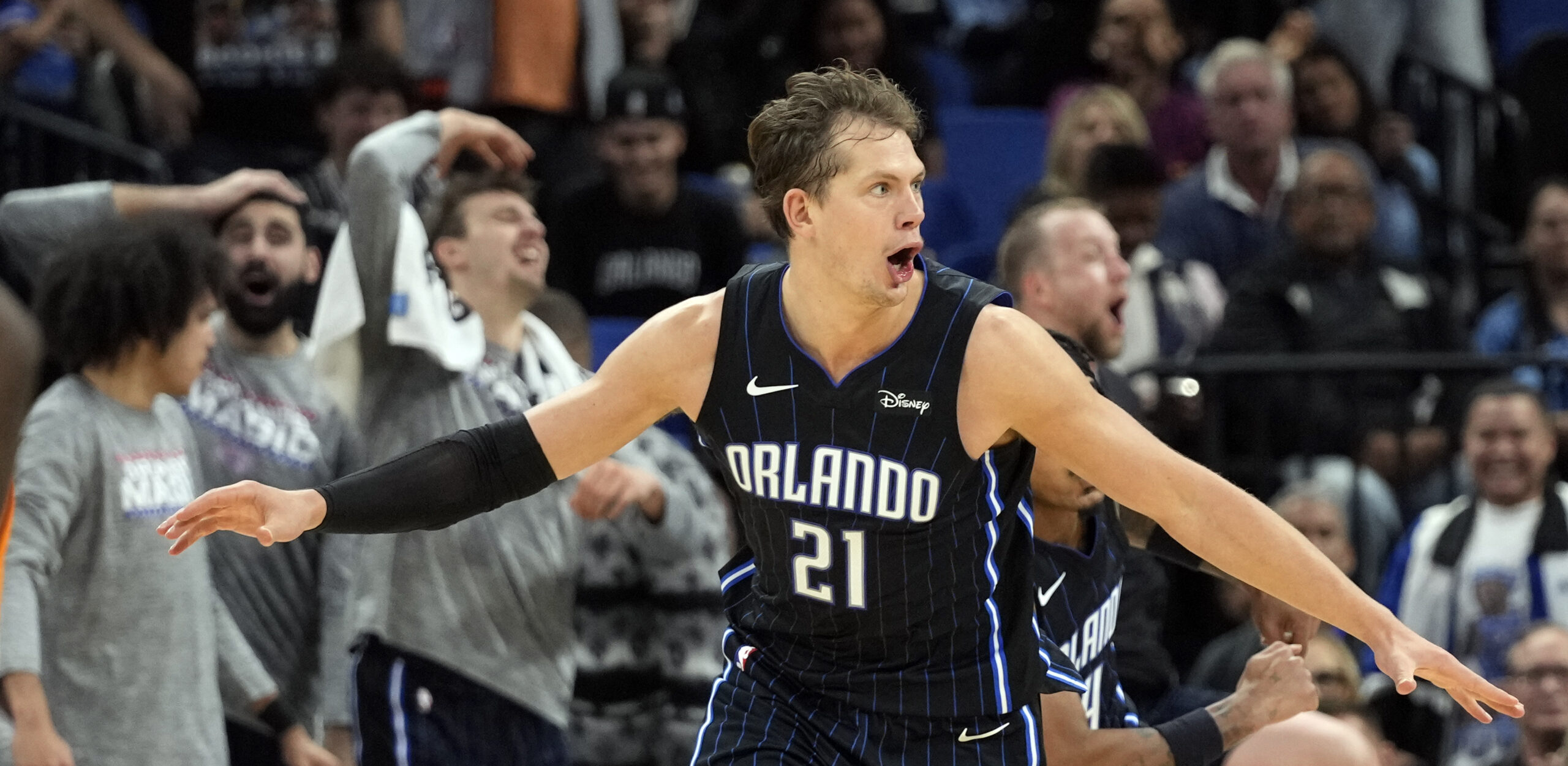 Orlando Magic center Moritz Wagner (21) celebrates after dunking the ball against the Washington Wizards during the second half of an NBA basketball game, Wednesday, Nov. 29, 2023, in Orlando, Fla. (AP Photo/John Raoux)